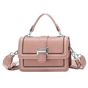 Pink square handbag with silver H-clasp and stylish patterned wide shoulder strap