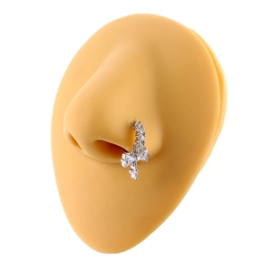 Silver bow nose ring with zircon heart pendant displayed on a silicone model nose