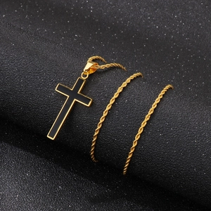 Minimalist gold stainless steel cross necklace with black enamel center on rope chain