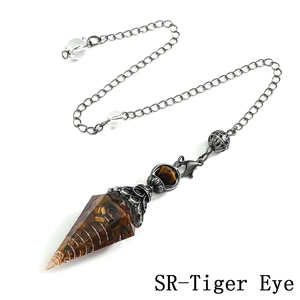 Detailed view of Tiger Eye crystal dowsing pendulum with antique silver chain