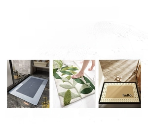 Detail of Nordic non-slip door mats featuring grey minimalist and green embossed leaf patterns