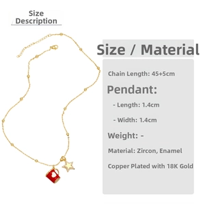 Detail of 18K gold-plated necklace featuring a red star cup and zircon star pendant