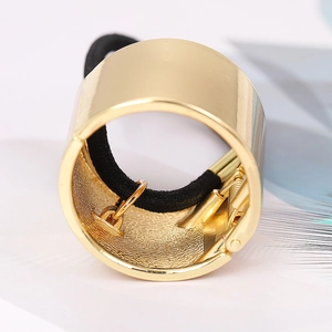 Polished gold metal ponytail cuff with elastic band for sleek hair styling jewelry