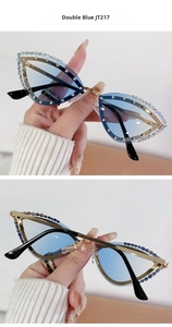 Detail of cat eye sunglasses JT217 with light blue lenses and rhinestone encrusted gold frame