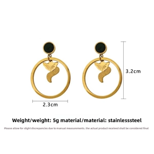 Detail view of golden stainless steel fox earrings with dimensions 3.2cm by 2.3cm