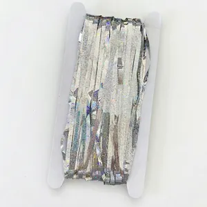 Silver holographic laser foil curtain for party backdrop decoration on cardboard