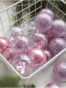 Pink and clear 6cm Christmas ball ornaments with glitter and beads in a white basket