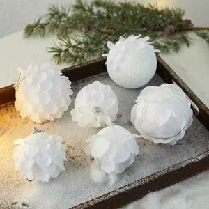 Set of 6 white foam Christmas balls with petal textures in a rustic wooden tray decoration