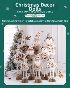 Close-up of three Christmas dolls set featuring reindeer, Santa and snowman in warm knits
