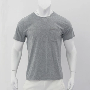 Detailed texture of grey cotton fabric on short sleeve Henley shirt with chest pocket