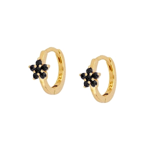 Detail of 925 silver gold-plated hoop earrings with black flower shaped gemstone