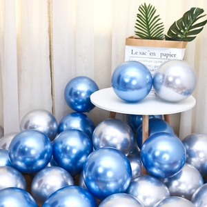 Close-up of thick latex balloons in metallic blue and silver for birthday party decor