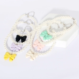 Colorful pearl dog collar with bow pendant in six pastel colors for small pets