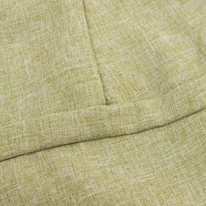 Detailed texture of light olive green linen fabric with fine stitching for women's set