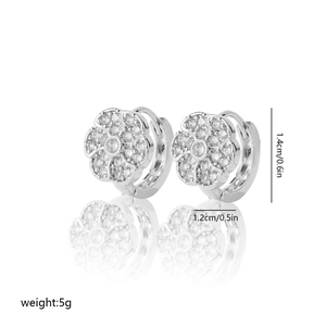 Macro view of silver floral hoop earrings with cubic zirconia and dimension labels