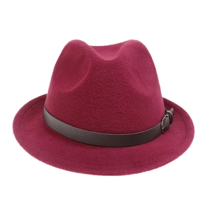 Detail of wool jazz hat in wine red with a dark brown leather belt and vintage buckle