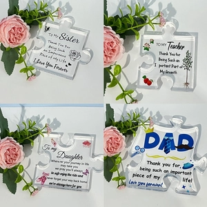 Set of four acrylic puzzle pieces for family and teachers with floral decorations