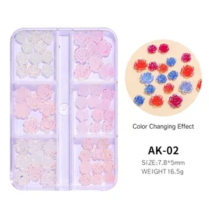 Macro detail of UV light-sensitive color-changing resin flower nail charms in storage box