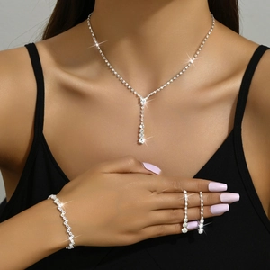 Sparkling silver wedding jewelry set with crystal necklace, bracelet and earrings