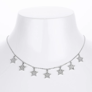 Detailed view of S925 silver star necklace with micro-paved zircons on jewelry mannequin