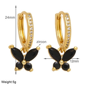 Detailed view of gold butterfly earrings with black zircon wings and 24mm height specs