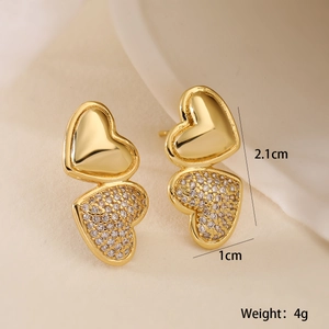 Detail view of 18K gold plated heart earrings with dimensions 2.1cm and 4g weight