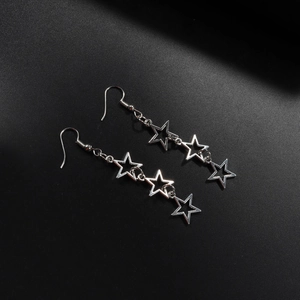 Elegant silver long drop earrings featuring three hollow star pendants for a minimalist look