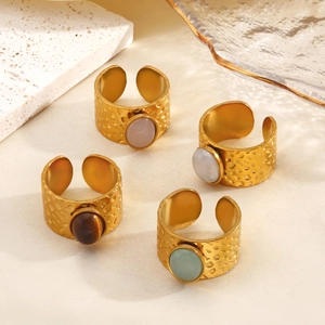 Set of four adjustable gold stainless steel rings with colorful oval semi-precious stones