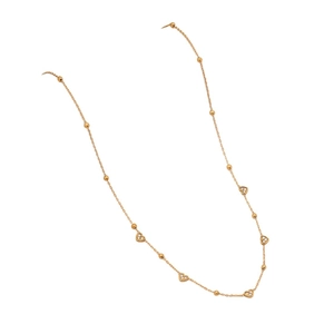 Elegant gold stainless steel necklace with heart-shaped pendants and small beads on white backdrop