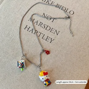 Detailed view of necklace with Hello Kitty pendant and 54cm chain plus extension