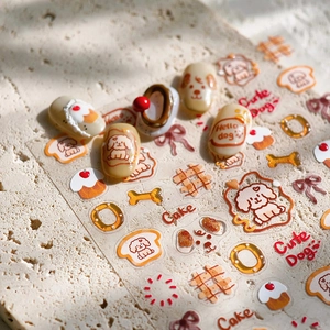 3D embossed cartoon dog nail stickers featuring poodles and sweets on marble surface