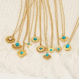 Bohemian gold stainless steel necklaces with sun, evil eye, and turquoise pendants