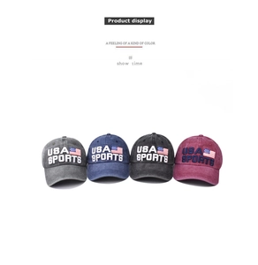 Detail of vintage washed cotton baseball caps with USA embroidery in four colors