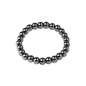Macro detail of dark grey hematite beads showing smooth metallic luster on the bracelet