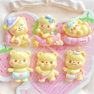 6pcs cute yellow resin bear charms for crafts and hair accessories on a pink plate