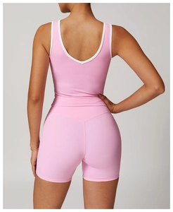 Detail view of the open-back design and high-waist fit of this pink yoga set