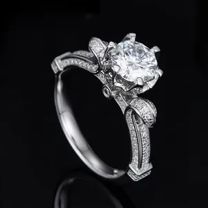 Moissanite ring in swan lake style with 1 carat round stone and six-prong silver setting