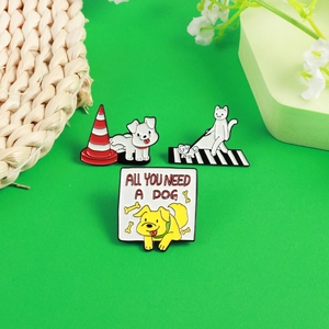 Three cute cartoon dog enamel pins featuring walking and humorous scenes on green background