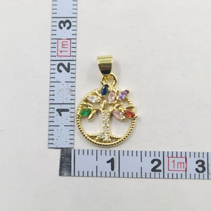 Detailed view of gold Tree of Life pendant with multicolor gemstones and 2.8cm size scale