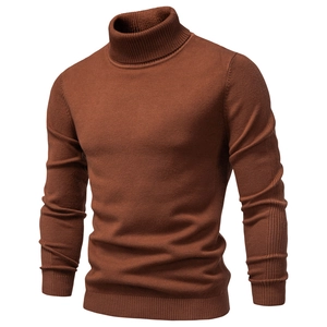 Detailed close-up of brown knit turtleneck sweater showing slim fit and fine texture