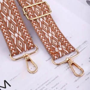 Ethnic wide shoulder strap with brown geometric patterns and gold metal hooks