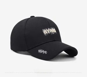 Side view of a black baseball cap featuring white STARS embroidery and artistic graffiti art