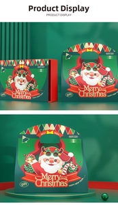 Close-up of green Christmas gift box with Santa illustration and red ribbon handle