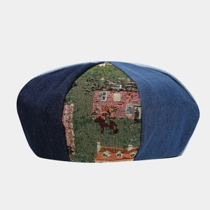 Artistic denim patchwork beret featuring scenic jacquard landscape and vintage design