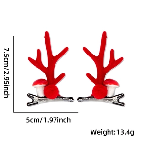 Detailed view of Christmas antler hair clips with size and weight measurements
