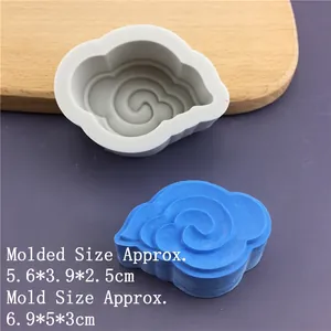 Detail view showing silicone mold and blue auspicious cloud resin shape with size specs
