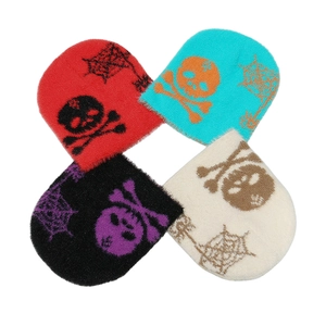 Winter beanie hats with skull and spider web jacquard patterns in four diverse colors