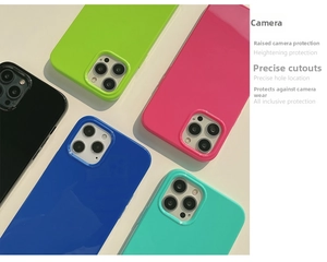 Detail showing raised camera lens protection and precise cutouts on colorful silicone cases