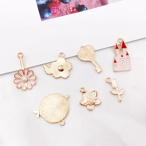 Pink DIY alloy jewelry pendants with flower and key shapes in gold finish and pearls