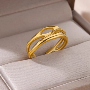 Macro shot of 18k gold plated stainless steel open ring with artistic cutout design